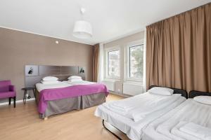 Postel nebo postele na pokoji v ubytování Best Western Plus Park Airport Hotel