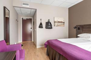 Postel nebo postele na pokoji v ubytování Best Western Plus Park Airport Hotel
