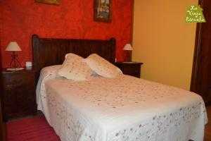 Ein Bett oder Betten in einem Zimmer der Unterkunft Posada La Vieja Escuela