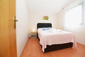 Postel nebo postele na pokoji v ubytování Apartment Lavender