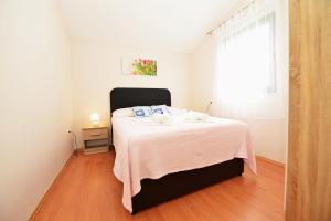 Postel nebo postele na pokoji v ubytování Apartment Lavender