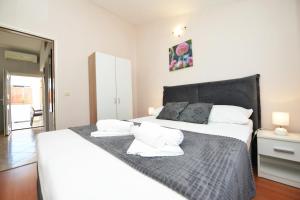 Postel nebo postele na pokoji v ubytování Apartment Lavender