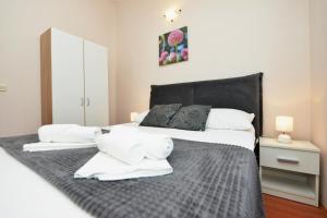 Postel nebo postele na pokoji v ubytování Apartment Lavender