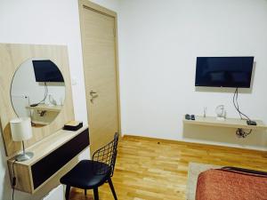 TV a/nebo společenská místnost v ubytování Apartman Blagojevic Hill