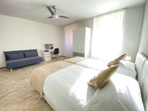 Letto o letti in una camera di Albergo Stazione