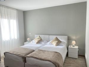 Letto o letti in una camera di Albergo Stazione