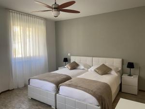 Letto o letti in una camera di Albergo Stazione