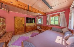 a living room with a couch and a table at Großmutters Haus in Westendorf