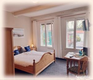 Postel nebo postele na pokoji v ubytování Hotel Packhaus