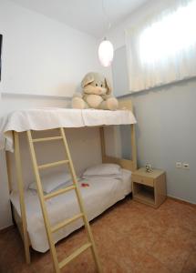 Letto o letti in una camera di Aigaio Studios tinos