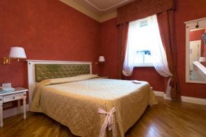 Letto o letti in una camera di Hotel Gennarino