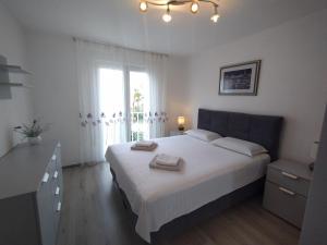 Postel nebo postele na pokoji v ubytování Apartment in Rovinj with Terrace, Air condition, WIFI, Washing machine (4686-2)