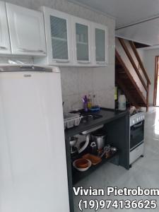 Nhà bếp/bếp nhỏ tại Apartamento Praia da Maranduba