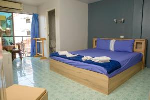 Postel nebo postele na pokoji v ubytování 2 Vikings Guesthouse