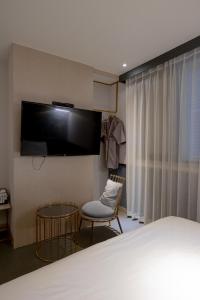 TV a/nebo společenská místnost v ubytování Hound Hotel Seomyeon-Beomcheon + 37 fotografií