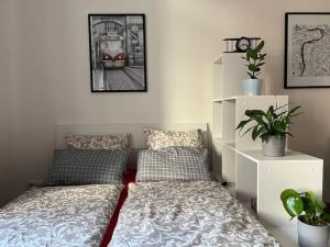 Postel nebo postele na pokoji v ubytování Modern apartment Krymská & Francouzská street
