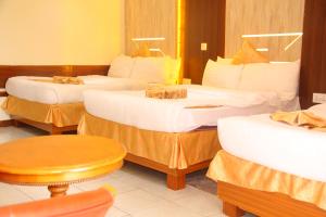 Meru Slopes Hotel客房内的一张或多张床位