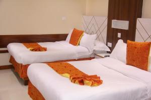 Meru Slopes Hotel客房内的一张或多张床位
