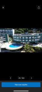 a picture of a building with a swimming pool at Angra dos reis, Praia Grande cond-angra inn in Angra dos Reis +29 photos