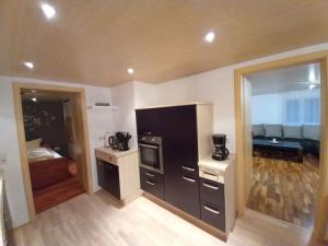 Kuchyň nebo kuchyňský kout v ubytování Ferienwohnung an der Alfenz
