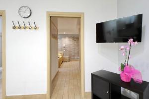 TV o dispositivi per l'intrattenimento presso Vatican Flat Cozy Court