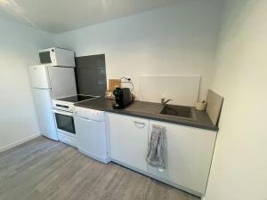 Kuchyňa alebo kuchynka v ubytovaní L Atelier d Amélie