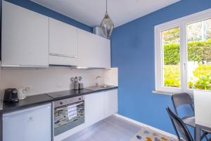 Kuchyň nebo kuchyňský kout v ubytování Happy Guest Apartments - Blue Apartment