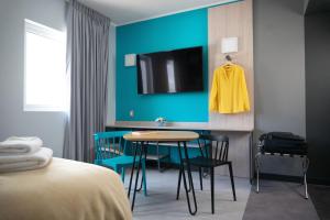 Postel nebo postele na pokoji v ubytování ibis Styles Antofagasta