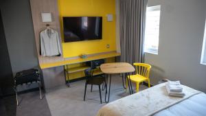 TV a/nebo společenská místnost v ubytování ibis Styles Antofagasta