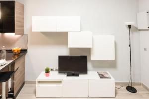 A kitchen or kitchenette at Mia Suite. Center of Seville