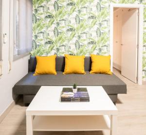 A seating area at Mia Suite. Center of Seville