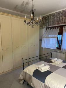 A bed or beds in a room at [Casa sul mare]+Posto auto+Giardino+WiFi