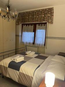A bed or beds in a room at [Casa sul mare]+Posto auto+Giardino+WiFi