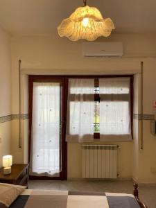 Kép [Casa sul mare]+Posto auto+Giardino+WiFi szállásáról Terracinában a galériában