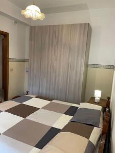 A bed or beds in a room at [Casa sul mare]+Posto auto+Giardino+WiFi