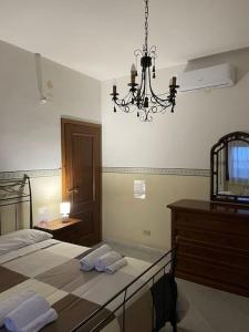 A bed or beds in a room at [Casa sul mare]+Posto auto+Giardino+WiFi