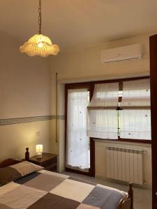 A bed or beds in a room at [Casa sul mare]+Posto auto+Giardino+WiFi