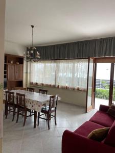 A seating area at [Casa sul mare]+Posto auto+Giardino+WiFi