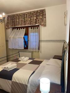 A bed or beds in a room at [Casa sul mare]+Posto auto+Giardino+WiFi