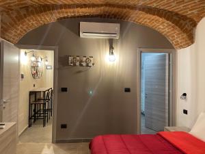 Posteľ alebo postele v izbe v ubytovaní HappyHome Bilocale centro storico Rivarolo Canavese