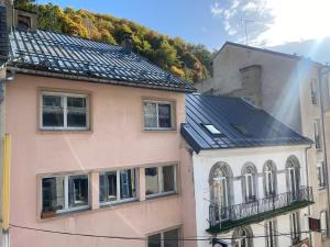 a building with a solar roof on top of it at Boost Your Immo Ramond Barèges PM26 in Barèges