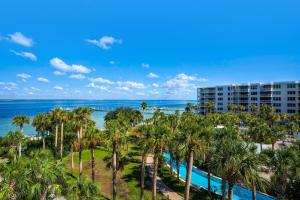 an aerial view of the resort and the ocean at Heron 507- A Wave From It All in Fort Walton Beach