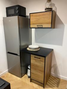 Kuchyňa alebo kuchynka v ubytovaní EXPO KRUPÓWKI 60 APARTMENT