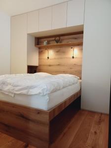 Postel nebo postele na pokoji v ubytování Apartment Deluxe Ossiacher See - Gerlitzen