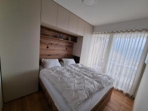 Postel nebo postele na pokoji v ubytování Apartment Deluxe Ossiacher See - Gerlitzen