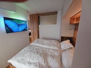 Postel nebo postele na pokoji v ubytování Apartment Deluxe Ossiacher See - Gerlitzen