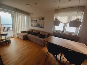 Posezení v ubytování Apartment Deluxe Ossiacher See - Gerlitzen
