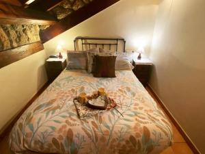 A bed or beds in a room at El Invernal de Picos