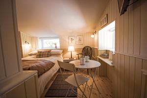 Photo de la galerie de l'établissement The Old Smithy Inn, à Welcombe 18 autres photos