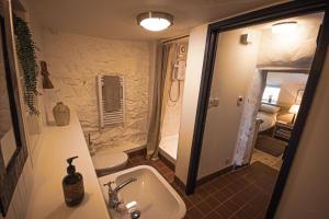 Photo de la galerie de l'établissement The Old Smithy Inn, à Welcombe